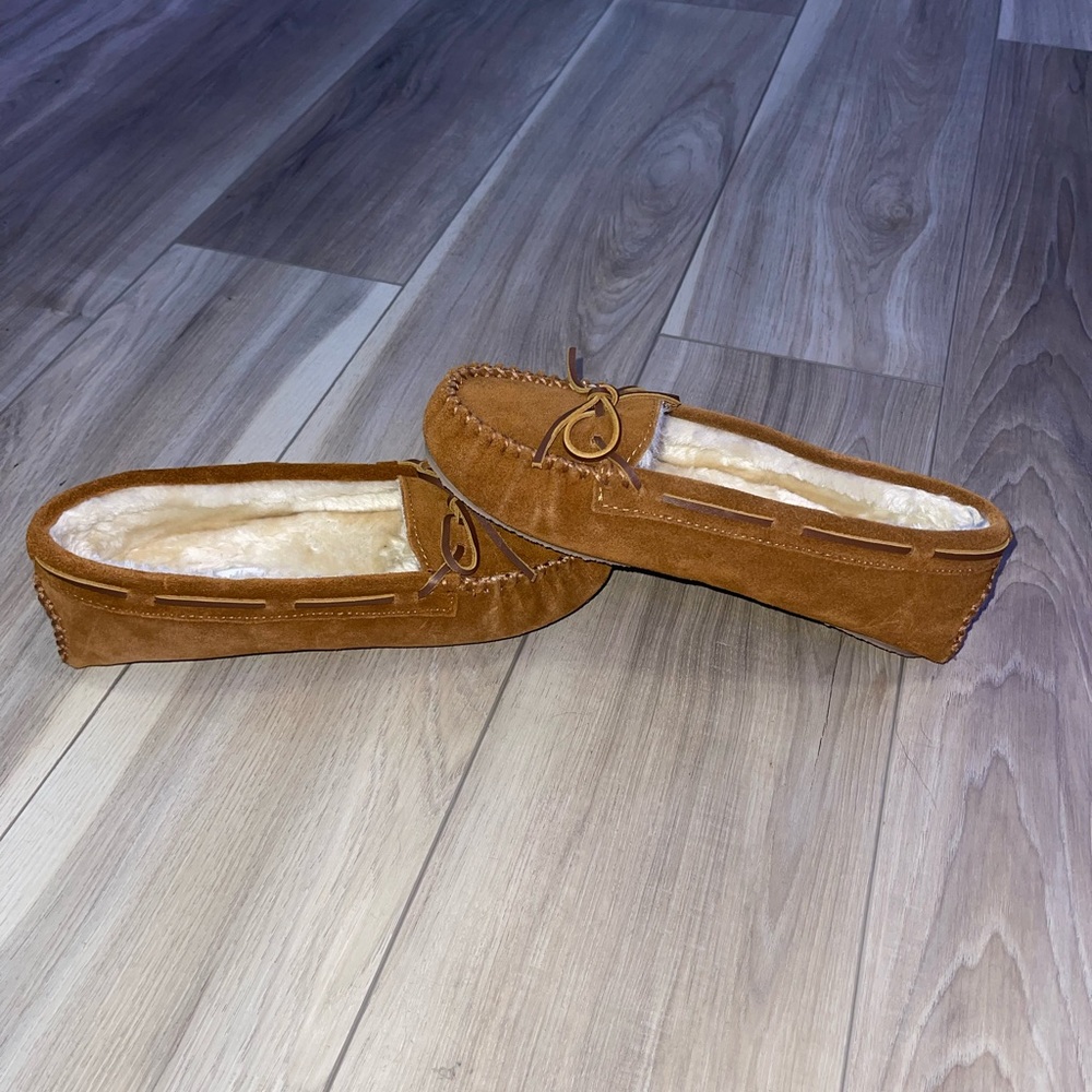 Minnetonka Moccasins. Size: 10.5
